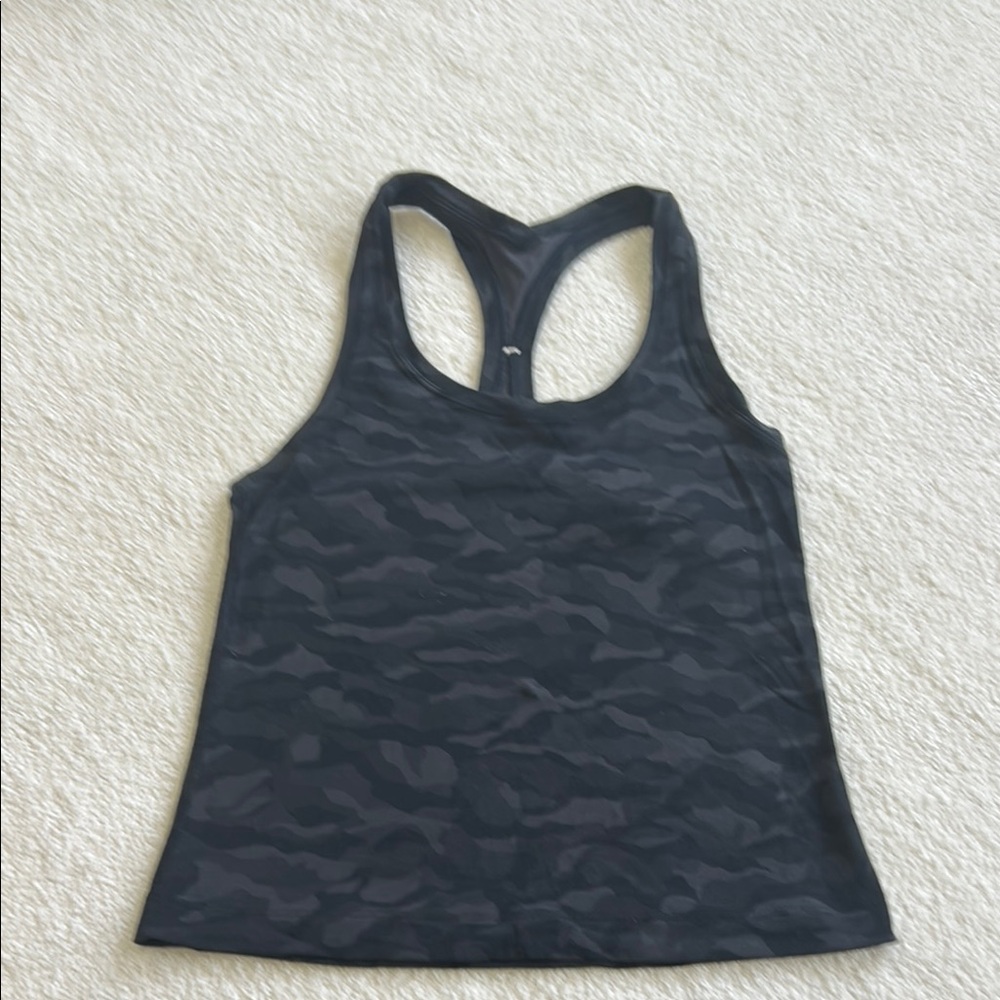 Lululemon size 4 cool racer back Black Camo Tank. Short length. great condition